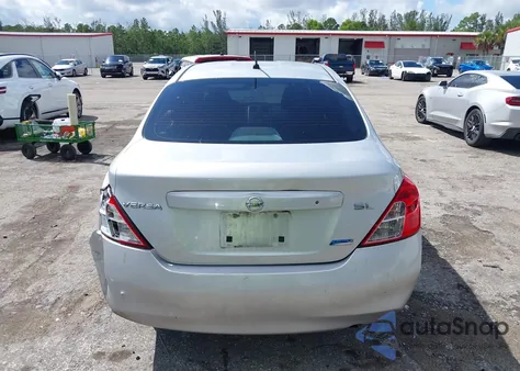 2012 Nissan Versa 1.6 Sl z USA, uszkodzony, nr VIN 3N1CN7APXCL909053